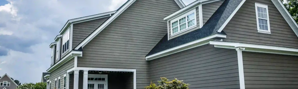 Profile of a house with grey vinyl siding